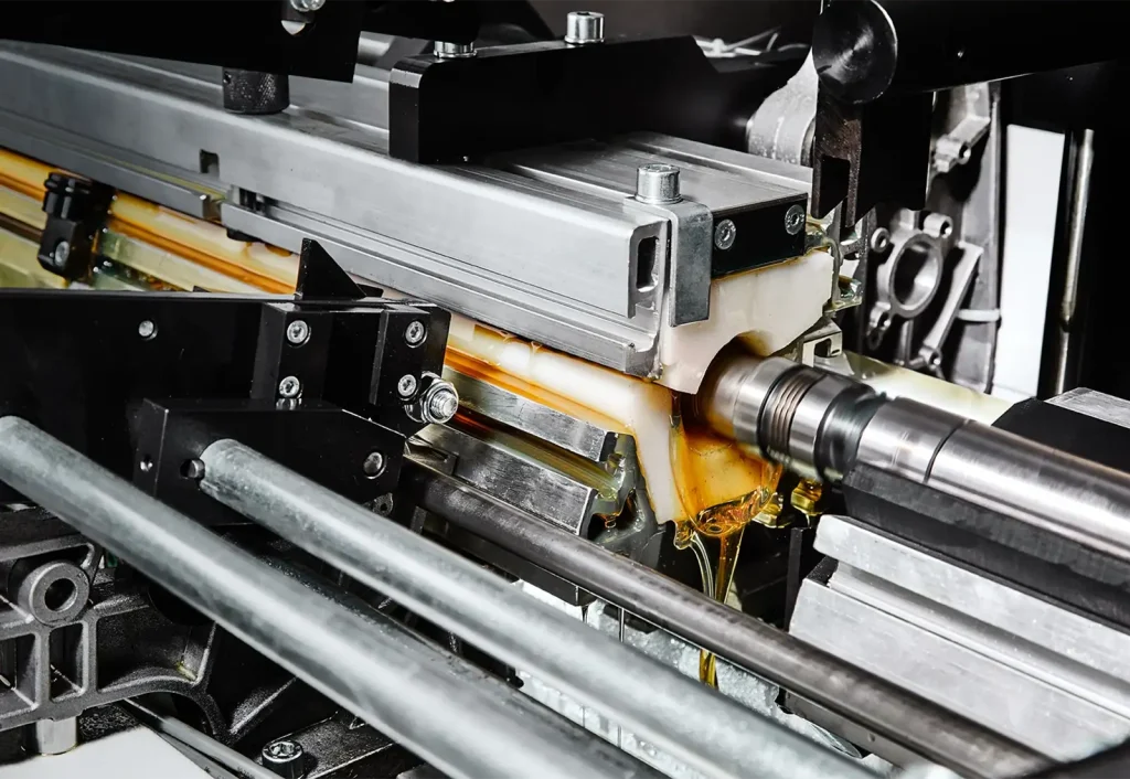 Feed and guidance of the material bar (two-stage)